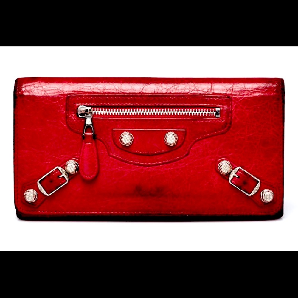 BALENCIAGA
Belenciaga folding Red Leather wallet.